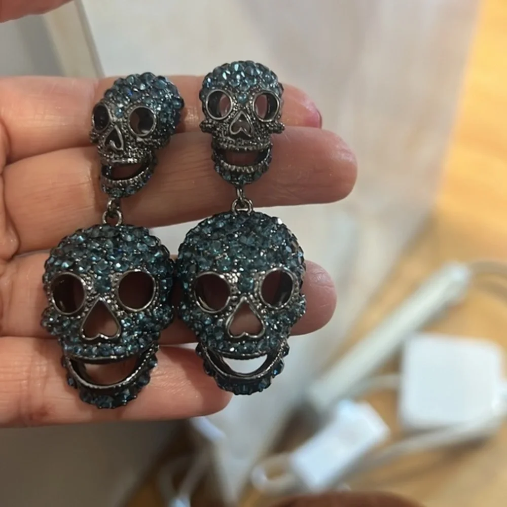 Gunmetal skull earrings